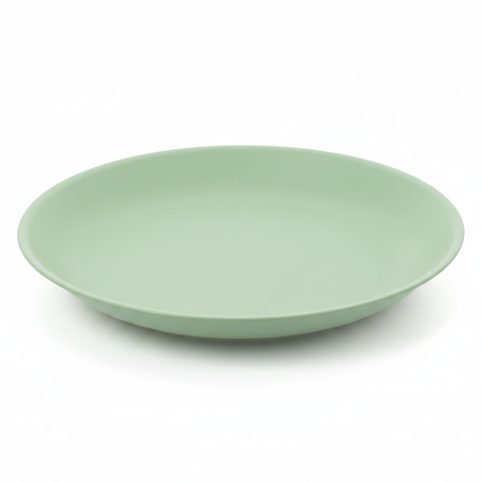Assiette vert d'eau photo studio fond blanc